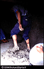 mixing clay by foot