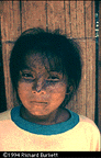 young Kichwa girl with painting on her face