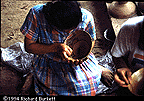 Olivia painting a mucawa