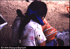 Dora painting a tinaja - a Kichwa vase form